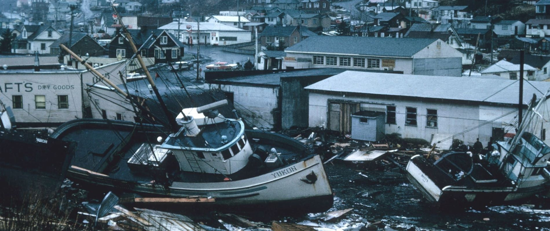 Hurricane Storm Serge in town with fishing boats, logs and other debris blocking streets.